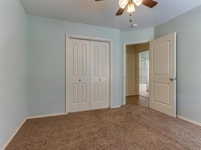20140 N Rolling Meadows Dr, Luther, OK 73054 - unfurnished bedroom featuring carpet floors, a closet, baseboards, and a ceiling fan