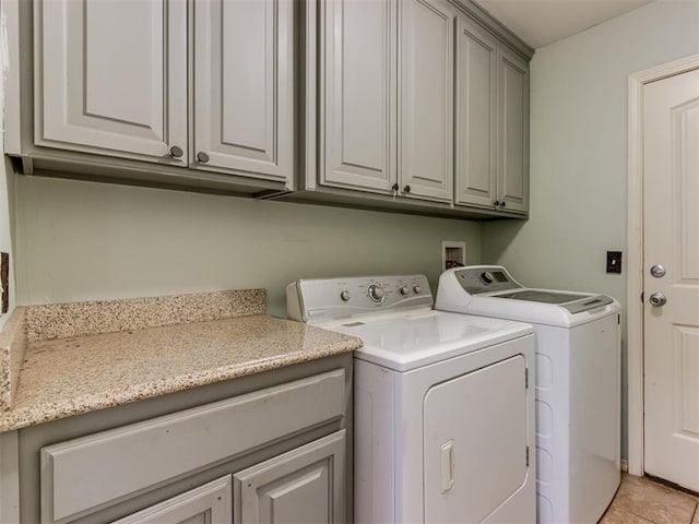 20140 N Rolling Meadows Dr, Luther, OK 73054 - washroom with washing machine and dryer, cabinet space, and light tile patterned flooring