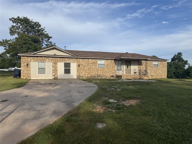 6300 S Hiwassee Rd, Oklahoma City, OK 73150 - ranch-style house with stone siding, a front yard, and concrete driveway