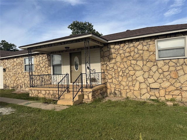 6300 S Hiwassee Rd, Oklahoma City, OK 73150 - view of front of house with covered porch, a front lawn, and a shingled roof