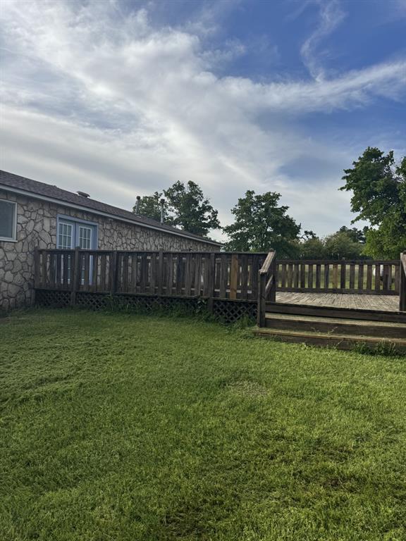 6300 S Hiwassee Rd, Oklahoma City, OK 73150 - view of green lawn featuring a wooden deck