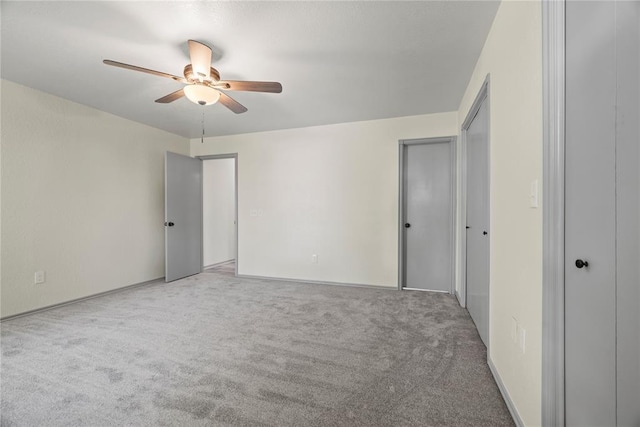 9800 Honeysuckle Rd, Oklahoma City, OK 73159 - unfurnished bedroom featuring carpet and a ceiling fan