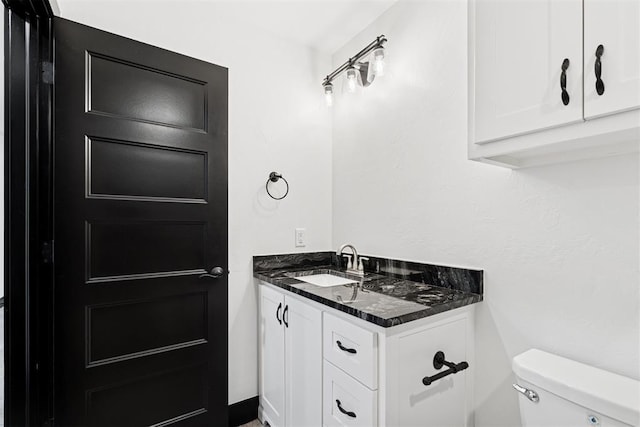 7217 Painted Sky Dr, Edmond, OK 73034 - bathroom featuring toilet and vanity