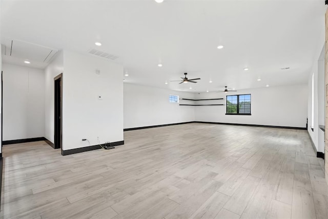 7217 Painted Sky Dr, Edmond, OK 73034 - unfurnished room featuring attic access, light wood-style floors, recessed lighting, baseboards, and a ceiling fan