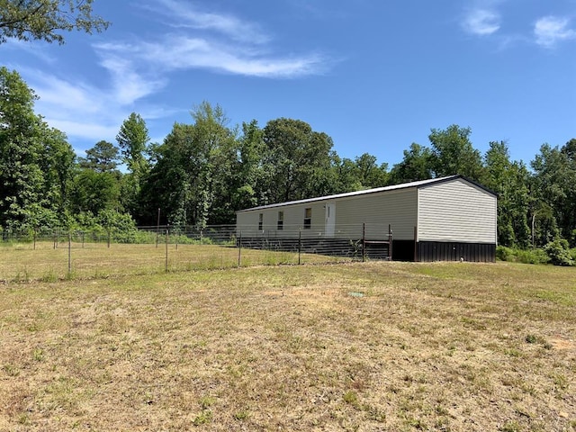 559 Poppy Rd, Broken Bow, OK 74728 - view of yard with a pole building and fence