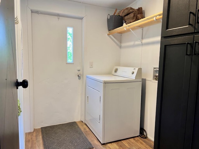 559 Poppy Rd, Broken Bow, OK 74728 - laundry room featuring washer / dryer, laundry area, and light wood-style flooring