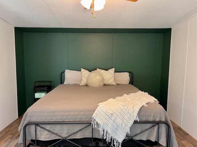 559 Poppy Rd, Broken Bow, OK 74728 - bedroom featuring wood finished floors