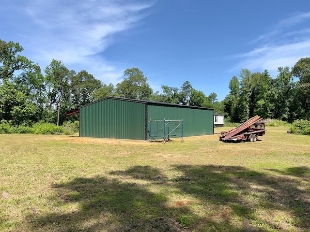 559 Poppy Rd, Broken Bow, OK 74728 - view of pole building featuring a lawn