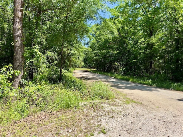 559 Poppy Rd, Broken Bow, OK 74728 - view of road with a view of trees