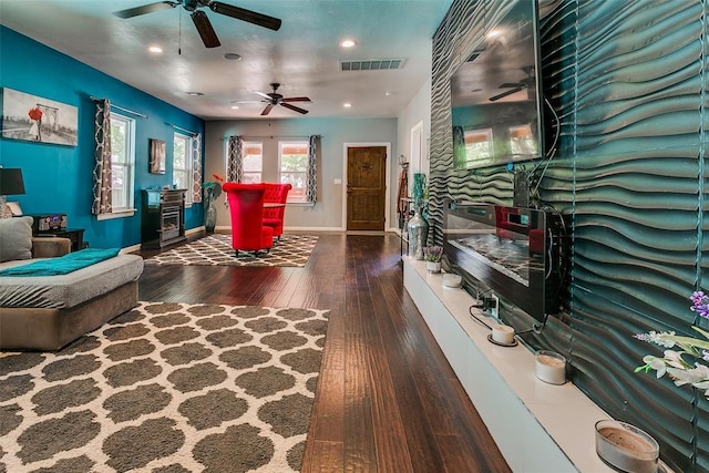 2107 NW 20th St, Oklahoma City, OK 73107 - living room featuring a fireplace, wood-type flooring, a ceiling fan, baseboards, and recessed lighting
