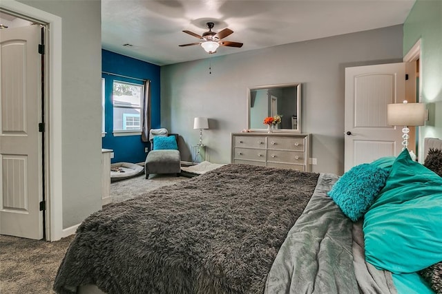 2107 NW 20th St, Oklahoma City, OK 73107 - carpeted bedroom featuring baseboards and a ceiling fan