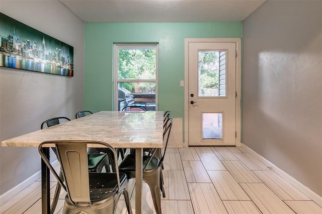 2107 NW 20th St, Oklahoma City, OK 73107 - dining area featuring baseboards