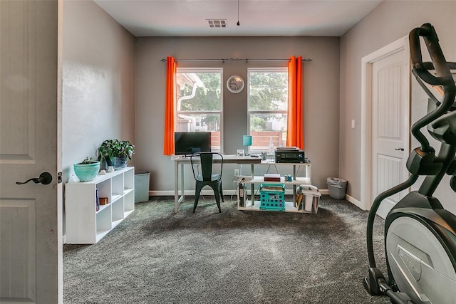2107 NW 20th St, Oklahoma City, OK 73107 - carpeted home office featuring baseboards