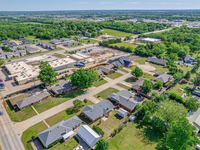 aerial overview of property's location with nearby suburban area