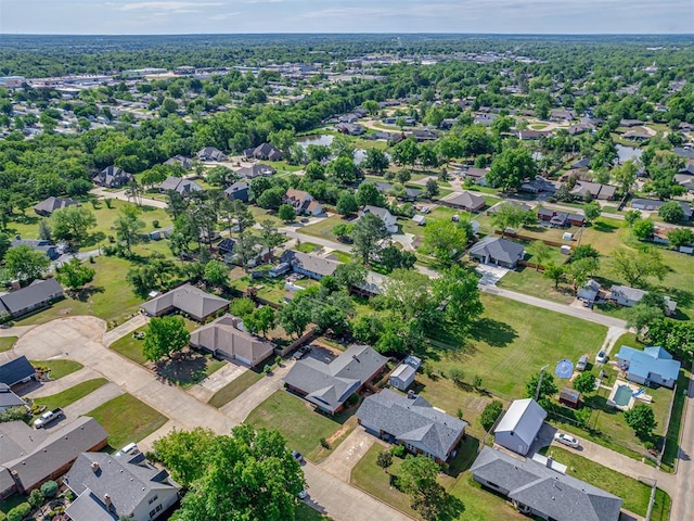 aerial view of property's location with nearby suburban area
