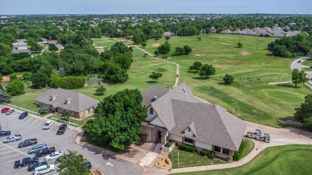 11125 NW 116th St, Yukon, OK 73099 - aerial perspective of suburban area featuring a golf course and a tree filled landscape