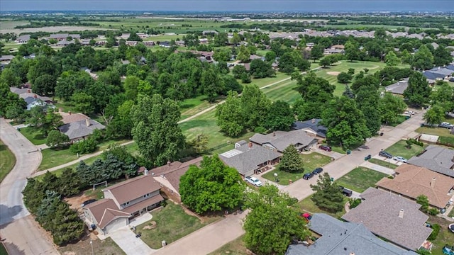 11125 NW 116th St, Yukon, OK 73099 - aerial view of property and surrounding area featuring nearby suburban area
