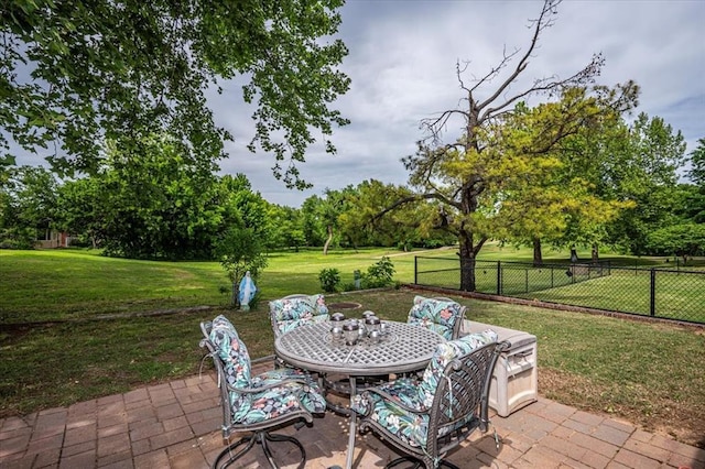 11125 NW 116th St, Yukon, OK 73099 - view of patio with outdoor dining area