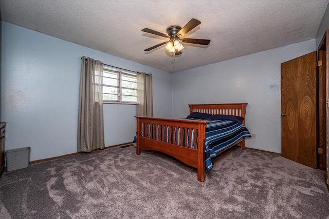 11125 NW 116th St, Yukon, OK 73099 - bedroom featuring carpet floors, a textured ceiling, baseboards, and ceiling fan