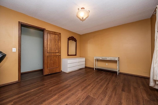 11125 NW 116th St, Yukon, OK 73099 - unfurnished bedroom featuring wood finished floors and baseboards