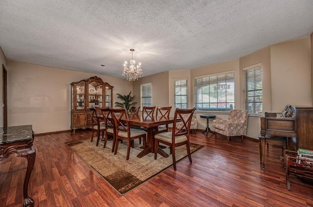 11125 NW 116th St, Yukon, OK 73099 - dining space with a textured ceiling, a chandelier, and wood finished floors