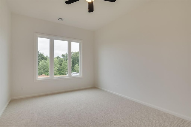 6516 NE 97th St, Oklahoma City, OK 73151 - spare room with light carpet and a ceiling fan