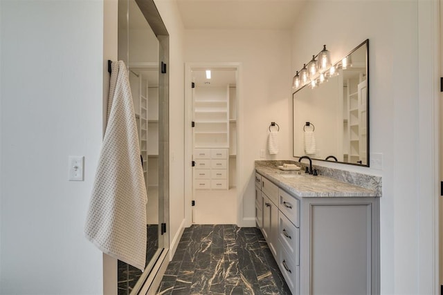 6516 NE 97th St, Oklahoma City, OK 73151 - full bathroom with marble finish floors, vanity, and a walk in closet