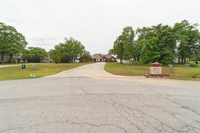 view of asphalt driveway