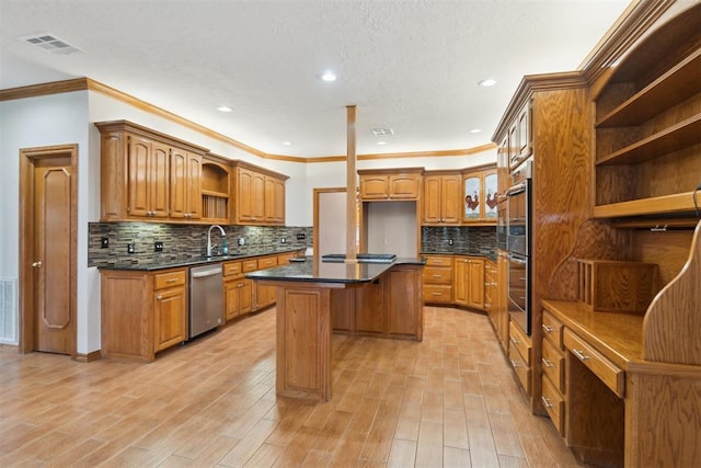 kitchen with open shelves, stainless steel appliances, a center island, crown molding, and brown cabinetry