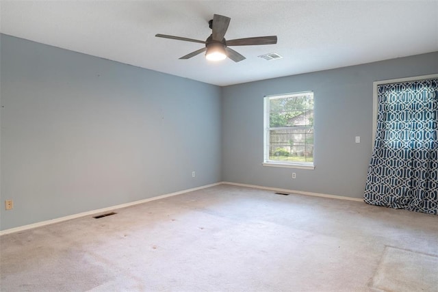 6408 Brentford Ter, Oklahoma City, OK 73132 - spare room featuring ceiling fan, carpet, and baseboards