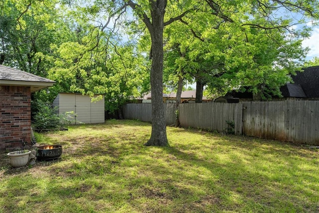 6408 Brentford Ter, Oklahoma City, OK 73132 - view of yard with a storage shed and an outbuilding
