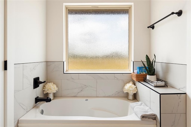 bathroom featuring a bath