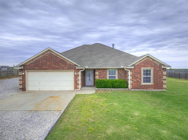 ranch-style home with concrete driveway, roof with shingles, an attached garage, and brick siding