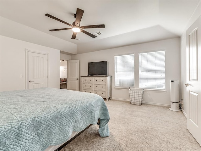 carpeted bedroom with baseboards, lofted ceiling, and a ceiling fan