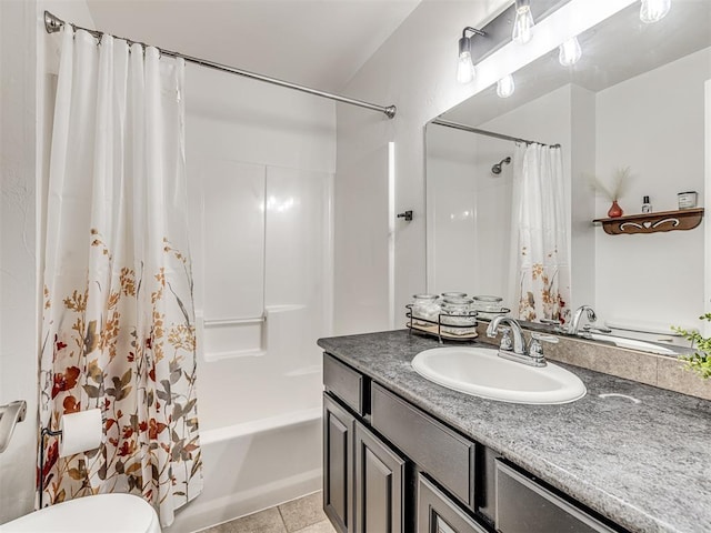 full bathroom featuring tile patterned flooring, toilet, shower / bath combo, and vanity