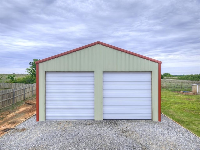 detached garage with fence