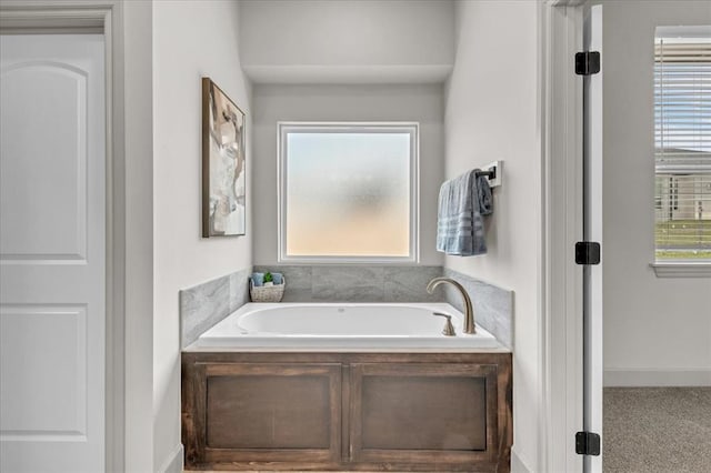 full bathroom featuring a bath