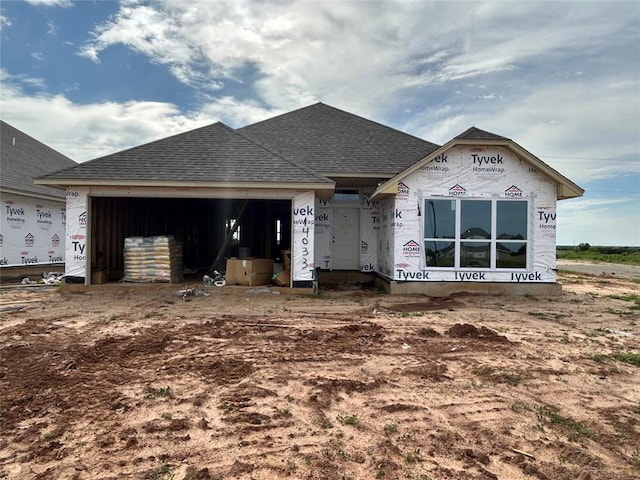 14033 Giverny Ave, Yukon, OK 73099 - property in mid-construction with a shingled roof and an attached garage