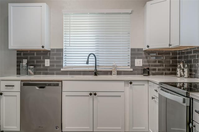 7301 Kings Manor Ct, Oklahoma City, OK 73132 - kitchen with dishwasher, range with electric cooktop, and white cabinets