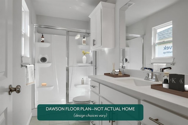 bathroom with a shower stall, toilet, vanity, and tile patterned flooring