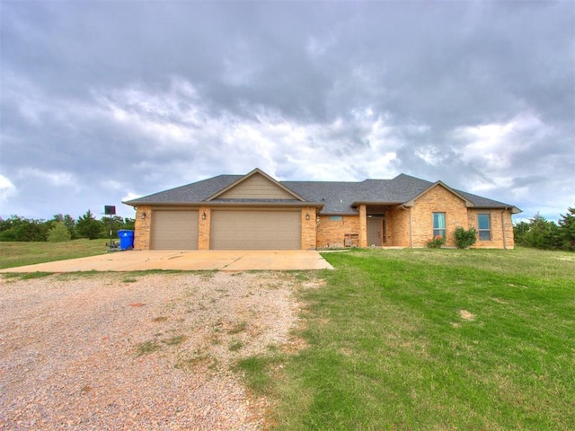 5702 Cedar Tree Cir, Guthrie, OK 73044 - single story home with driveway, a garage, a front yard, brick siding, and a shingled roof