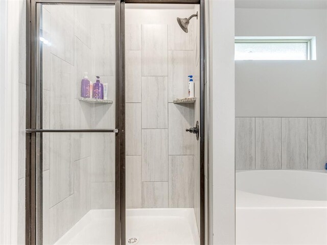 5702 Cedar Tree Cir, Guthrie, OK 73044 - full bath with a stall shower and a bath