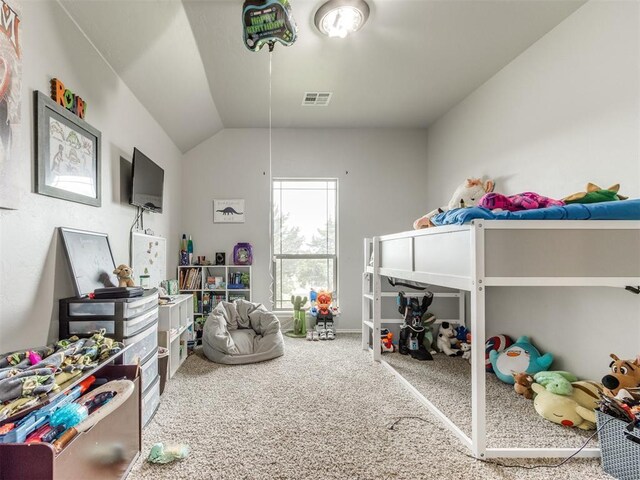 5702 Cedar Tree Cir, Guthrie, OK 73044 - carpeted bedroom featuring vaulted ceiling