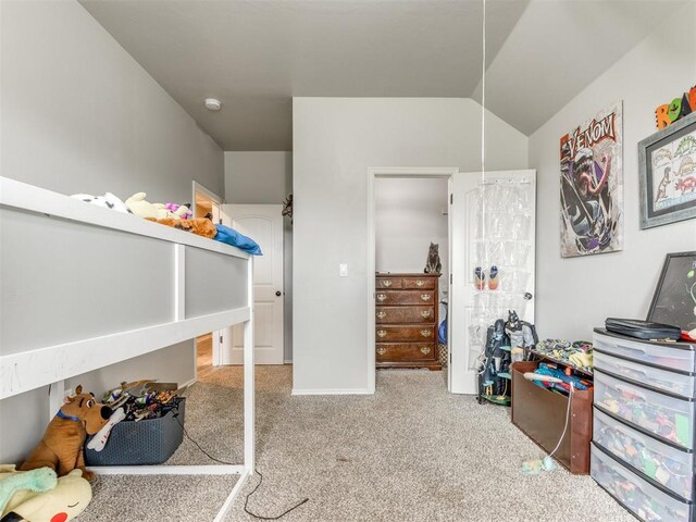 5702 Cedar Tree Cir, Guthrie, OK 73044 - bedroom featuring carpet flooring and lofted ceiling