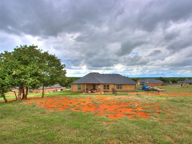5702 Cedar Tree Cir, Guthrie, OK 73044 - view of front of house featuring brick siding