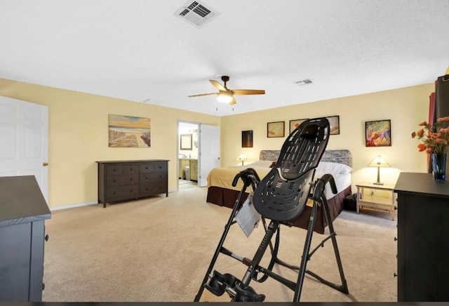 bedroom with light colored carpet, ceiling fan, and baseboards