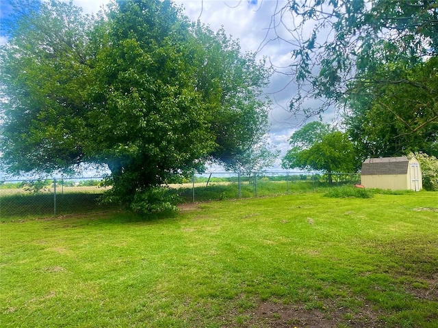 327 Englebretson Ln, Tuttle, OK 73089 - view of yard with a storage shed and an outdoor structure