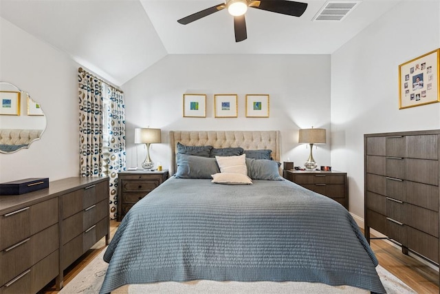 16309 Rangeland Dr, Oklahoma City, OK 73170 - bedroom with wood finished floors, a ceiling fan, vaulted ceiling, and baseboards
