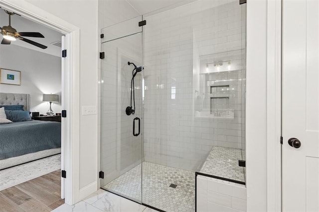 16309 Rangeland Dr, Oklahoma City, OK 73170 - full bath with ensuite bath, a stall shower, ceiling fan, baseboards, and marble finish flooring