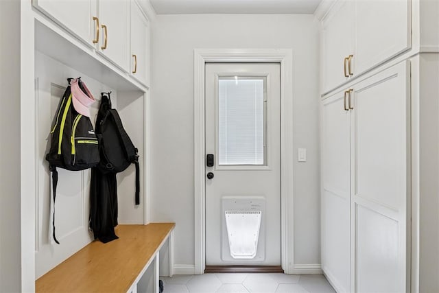 16309 Rangeland Dr, Oklahoma City, OK 73170 - mudroom with baseboards, light tile patterned floors, and heating unit